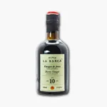 Botella de vinagre de Jerez de 10 años de la marca La Bodega, con etiqueta clara y tapa negra. Ideal para aderezos y platos gourmet.