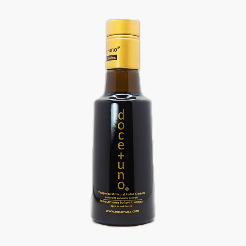147 Botella de aceite de oliva virgen extra de la marca Doceuno, con diseño elegante y tapa dorada, ideal para aderezar ensaladas y platos gourmet.