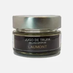 Frasco de vidrio con tapa metálica que contiene jugo de trufa de la marca Laumont, ideal para realzar sabores en platos gourmet.
