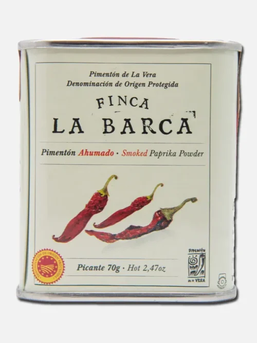 Lata de pimiento seco de la marca "La Barca", con tres chiles rojos en la etiqueta, peso neto de 250 gramos.