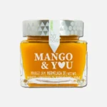 Tarro de mermelada de mango de la marca Mango & You, con etiqueta clara y diseño moderno, ideal para untar en tostadas o utilizar en postres.