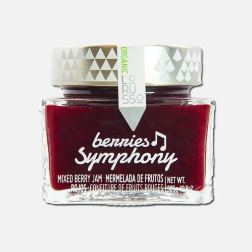 Tarro de mermelada "Bennies Symphony" con una mezcla de frutas, ideal para untar en panes y postres. Diseño elegante con tapa plateada.