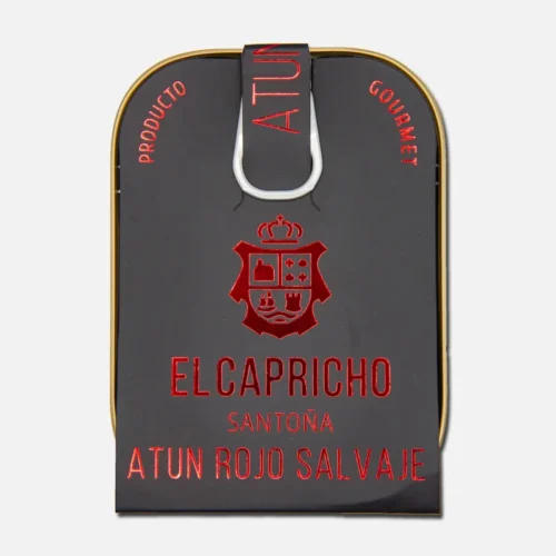 Lata de atún El Capricho, atún azul en aceite de oliva, con diseño elegante en fondo negro y texto en rojo. Ideal para recetas gourmet y platos saludables.