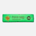 Barra de chocolate "Palo de Cielo" en envase verde, con diseño clásico y logotipos de la marca, ideal para postres y meriendas.